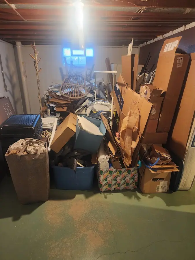 Roll-off dumpster container at job site for 2 Yard Dumpster Rental in Delhi